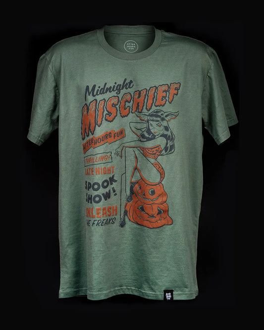 Front of the After Hours Fun Midnight Mischief t-shirt in an olive green heather fabric, featuring a vintage orange and black graphic of a Halloween pinup girl sitting on a jack-o'-lantern.